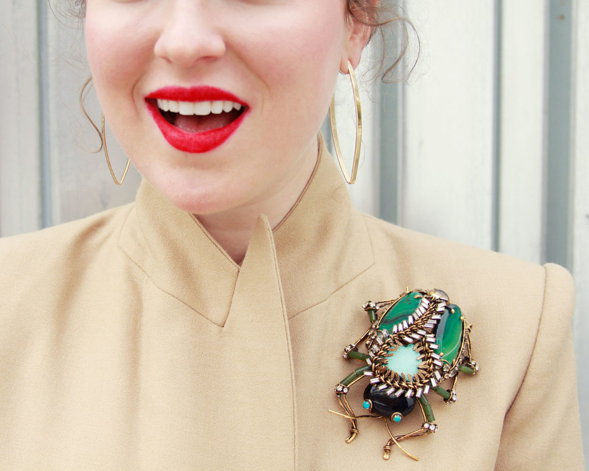 How to wear a brooch with lady silhouette: Fashion tips for a classy and chic look!