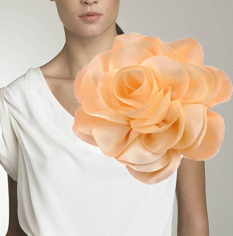 oversize flower brooch: Get the trendy look now, find out how to style it perfectly today